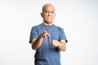 © Odua Images - angry asian bald man pointing ahead while standing on isolated background