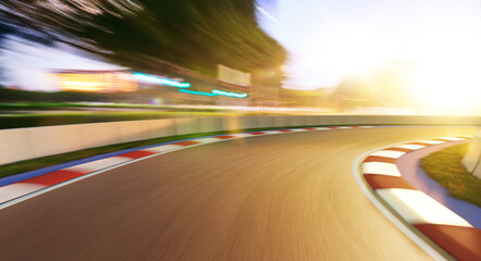 Wall Mural - Motion blurred racetrack,golden hour mood