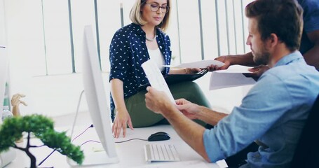 Sticker - Working hard in the office. 4K video footage of a diverse group businesspeople working together in a modern office.