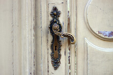 Old Door Handle. Wooden Entrance Door With Antique Door Handles. Selective Focus
