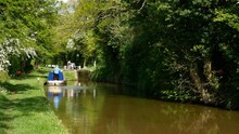 Idyllic Scene On The Oxford Canal A Distant Lock And Narrowboat