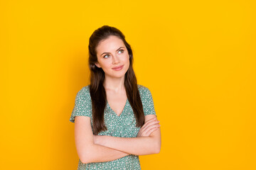 Poster - Photo of sweet dreamy woman wear print dress smiling arms folded looking empty space isolated yellow color background