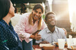 Multiracial people eating at food truck restaurant outdoor - Focus on senior woman eyes