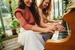© Jacob Lund - Friends playing the piano together