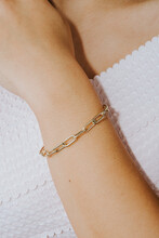 Diamond Bracelets On The Girl's Wrist With Well-groomed White Nail Polish. Jewelry Models For Online Sale.