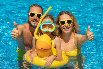 Wall Mural - Happy family in outdoor pool