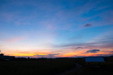 Wall Mural - colorful sunset and sunrise with clouds. blue and orange color of nature. many white clouds in the b