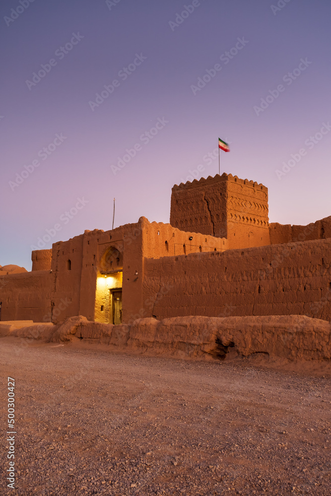 Saryazd Castle in Iran at sunset. Saryazd Fortress has been one of the ...