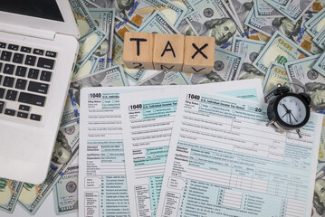 Blank forms 1040. US personal income tax return with accessories. Tax payment concept. Submission of a tax document.