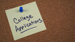 © MKPhoto - Note pinned to a cork board with a reminder about college applications