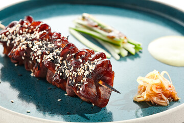 Canvas Print - Izakaya food - skewer yakitori with beef and teriyaki sauce. Grilled meat on bamboo stick in Japanese style. Bbq menu for asian restaurant. Yakitori on white background.