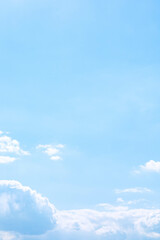 soft fluffy cumulus clouds above the light blue sky in sunny day. purity of natural white cloudscape