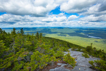 Cumulus Clouds Over The Summit Of Mount Kearsarge, New Hampshire.