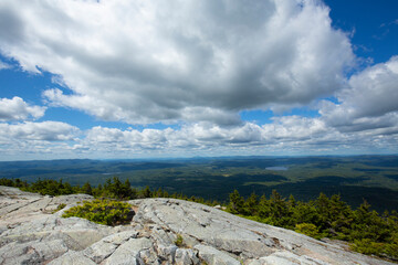 Canvas Print - Cumulus clouds over the summit of Mount Kearsarge, New Hampshire.