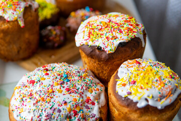 Wall Mural - Easter cakes with white fondant and colorful topping