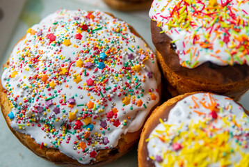 Wall Mural - Easter cakes with white fondant and colorful topping