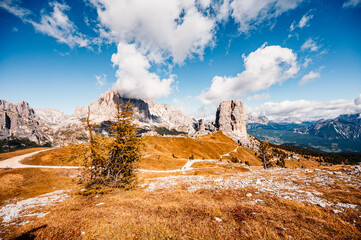 Majestic landscape of Alpine red autumn Cinque Torri, Passo Falzarego, Tofana. Wonderful hiking nature scenery in dolomite, italy near Cortina d'Ampezzo