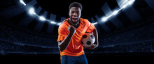 Victory. Excited Professional Soccer, Football Player In Football Kit Standing With Ball And Shouting Over Dark Night Stadium With Flashlights Background.