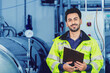 © Quality Stock Arts - Portrait Hispanic Latin smart engineer worker happy smile working in factory