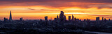 Fototapeta Miasto - Panorama of the urban skyline of London during an intense sunset with City, river Thames and London bridge