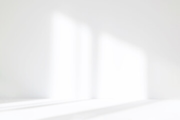 Fototapete - Abstract white studio background for product presentation. Empty room with shadows of window. Display product with blurred backdrop.