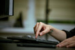 © fox17 - Female hands or woman office worker typing on the keyboard