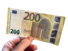 Hand Holding A 200 Euro Banknote. White Background.