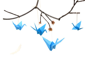 Wall Mural - Blue origami paper cranes haning isolated white