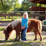 Happy girl with pony