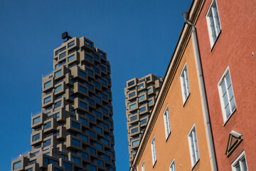 Stockholm, Sweden April 2, 2022 The new Norra Tornen residential building contrasts  with older more tradiotinal architecture.