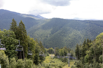 Wall Mural - Panorama of mountains in the Ukrainian Carpathians on a summer sunny day.