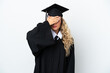 © luismolinero - Young university graduate woman isolated on white background covering eyes by hands. Do not want to see something
