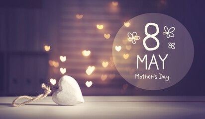 Wall Mural - Mother's Day message with a white heart with heart shaped lights