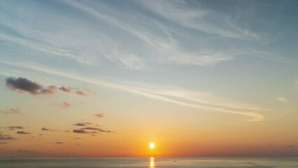 Wall Mural - time lapse video amazing scene of colorful sunset with moving clouds background in nature and travel