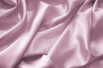 Wall Mural - Pink brown silk satin. Wavy folds. Silky shiny fabric. Elegant background with space for design.