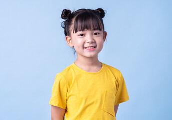 image of asian child posing on blue background