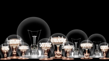 Wall Mural - Light bulbs going from dark to light with Expertise, Advice, Research, Teamwork and Knowledge fiber text on black background. High quality 4k video.