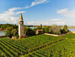 winery vineyards on a small island in Venice, Italy and bell tower 