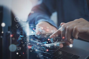 IoT Internet of Things, global business, digital marketing concept. Woman using laptop computer and  mobile phone with internet network connection