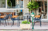 Fototapeta  - Chairs in the garden restaurant in Leptokarya, Greece.