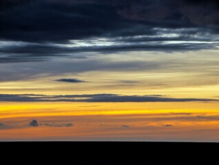 Wall Mural - Colored Clouds at Sunset