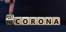 Covid-19 post or pre corona symbol. Turned wooden cubes and changed concept words Pre corona to Post corona. Beautiful grey background. Covid-19 pandemic post or pre corona concept. Copy space.