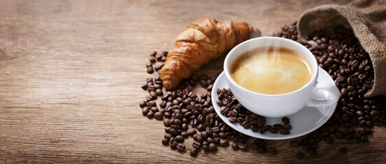 Wall Mural - cup of coffee, croissant and coffee beans
