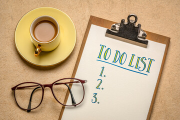 Canvas Print - to do list handwriting in a clipboard, flat lay with a cup of coffee and glasses, business, producti