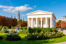 Temple Of Theseus In Volksgarten Park With City Hall At Background, Vienna, Austria