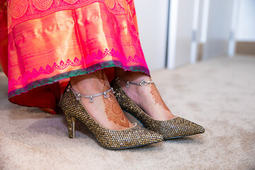 Indian bride's wedding shoes close up