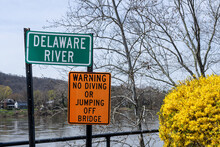 Warning, No Diving Or Jumping Off Bridge Sign At The Delaware River