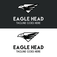 Wall Mural - Simple drawing of eagle head with piercing eye in silhouette style for financial company logo design