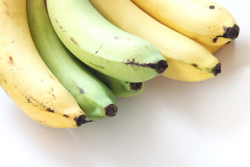 1 combed banana on a white background.