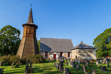 Wall Mural - Geta church (Saint George's chapel church) and cemetery in Geta, Åland Islands, Finland, on a sunny day in the summer. It's believed to be built in the 1460's.